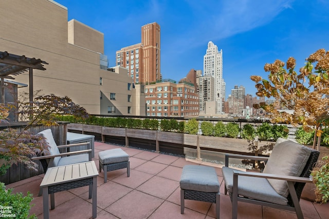 215 E 79th St Unit 6F, New York City, NY 10075 - view of patio / terrace with a view of skyline
