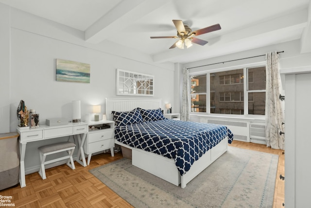 215 E 79th St Unit 6F, New York City, NY 10075 - bedroom featuring radiator, beamed ceiling, and ceiling fan