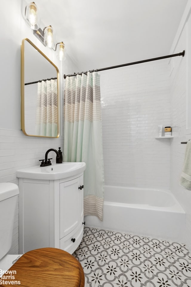 215 E 79th St Unit 6F, New York City, NY 10075 - full bath with vanity, shower / bath combo, and tile patterned floors