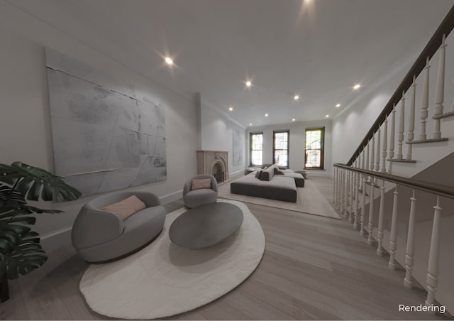 interior space featuring a fireplace, stairway, baseboards, light wood-style floors, and recessed lighting