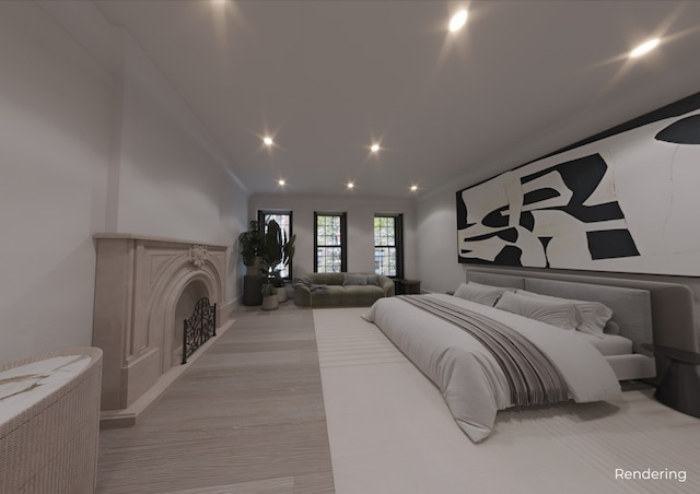 bedroom featuring a fireplace and recessed lighting