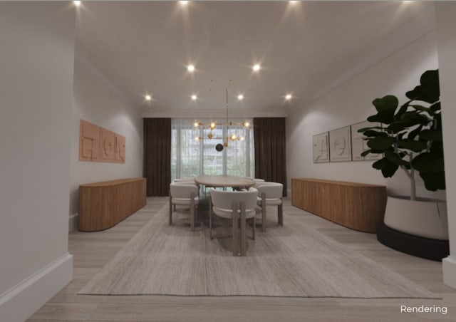 dining room with an inviting chandelier and light hardwood / wood-style flooring