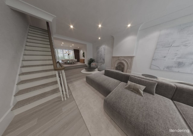 living room with stairs, recessed lighting, wood finished floors, and a fireplace