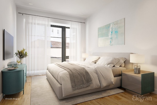 bedroom with light wood-type flooring