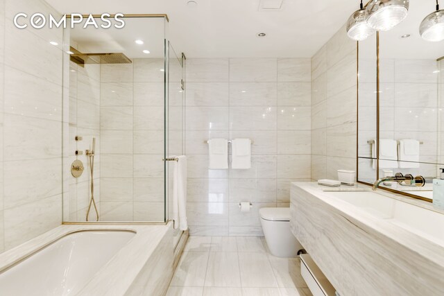 135 W 52nd St Unit 23C, New York City, NY 10019 - full bath featuring toilet, tile walls, a tile shower, a tub to relax in, and marble finish flooring
