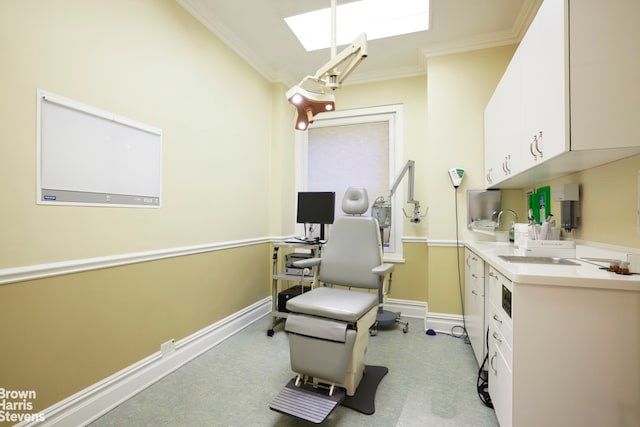 office with crown molding and a skylight