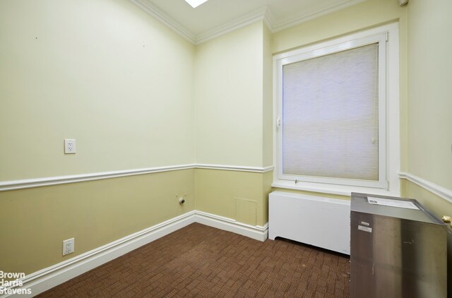 interior space with crown molding and sink