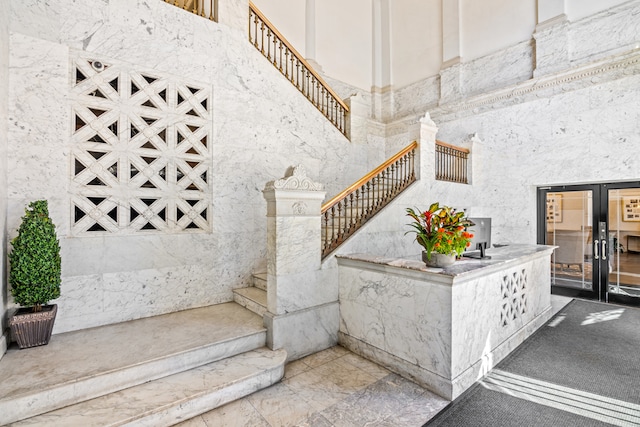 stairs with a towering ceiling