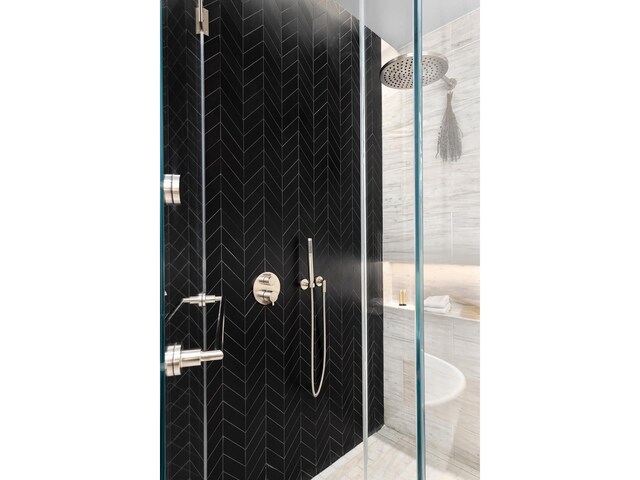 room details featuring a shower stall