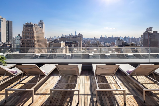 215 W 28th St Unit 12A, New York City, NY 10001 - wooden terrace featuring a view of skyline
