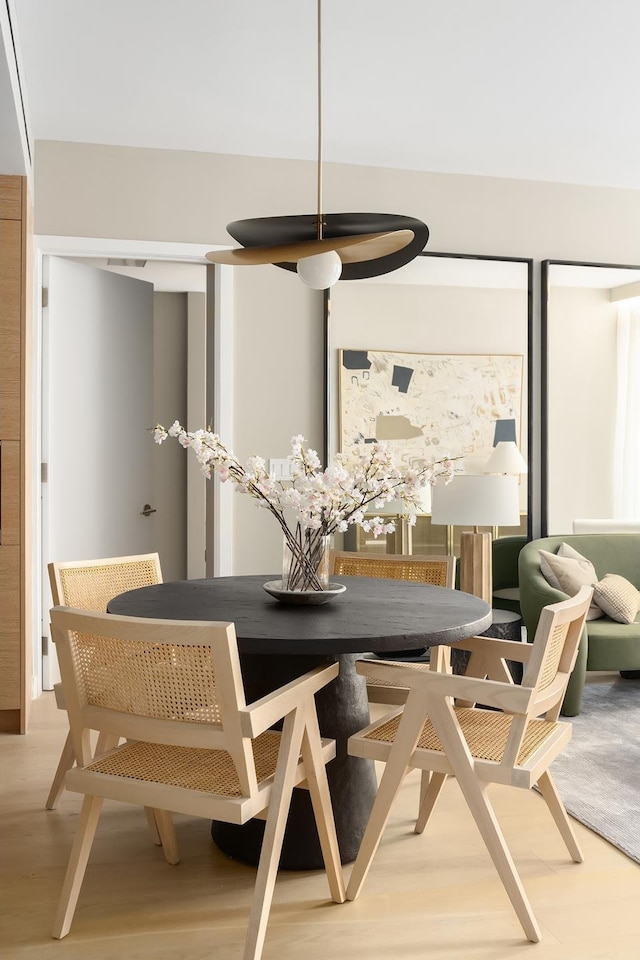 215 W 28th St Unit 12A, New York City, NY 10001 - dining space with wood finished floors