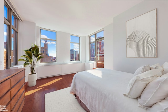 bedroom featuring wood finished floors