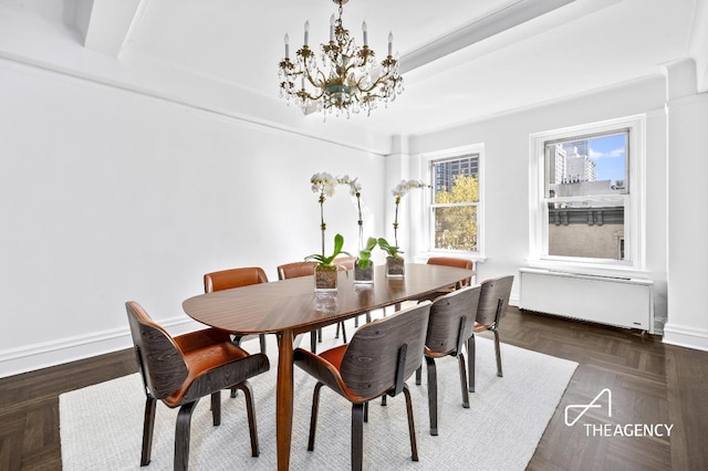 dining space featuring radiator, an inviting chandelier, dark parquet floors, and beamed ceiling