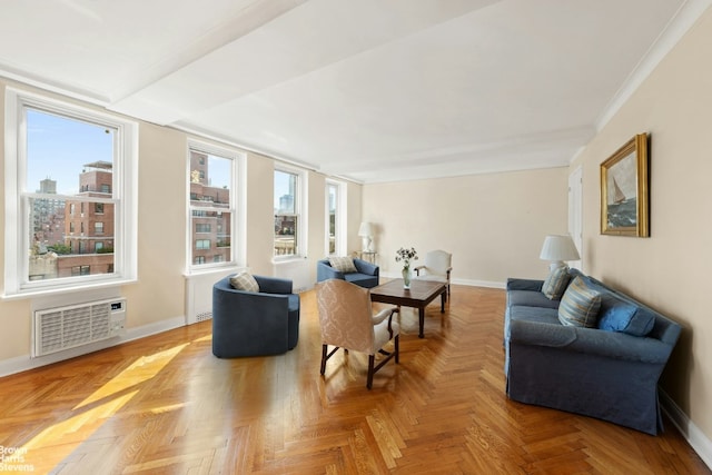 living room featuring crown molding and parquet floors