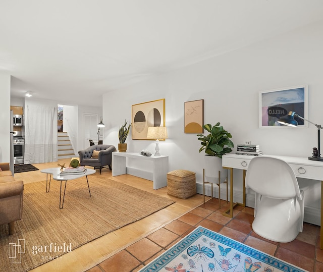 137 Bay Ridge Pkwy Unit 1, New York City, NY 11209 - living area featuring stairway and a desk
