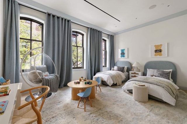 bedroom featuring crown molding