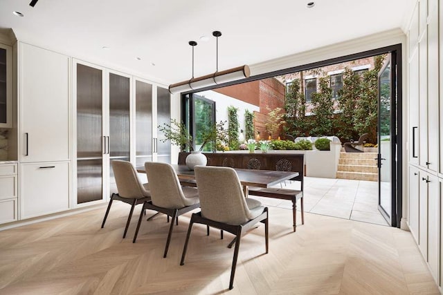 dining room featuring light parquet flooring