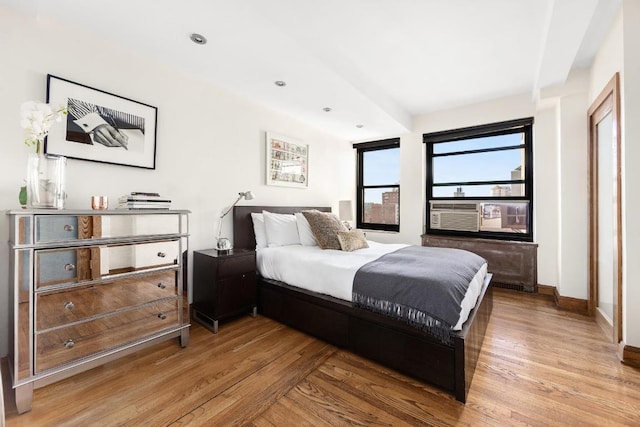 bedroom featuring wood-type flooring