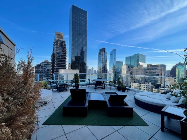 view of patio / terrace with a city view