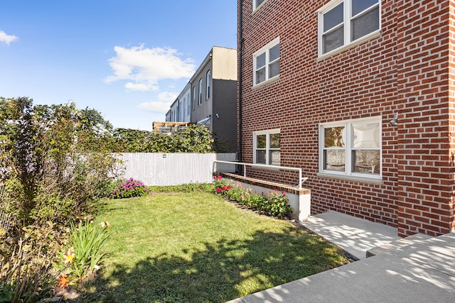 view of yard featuring fence