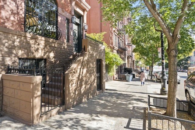 view of side of property featuring stucco siding