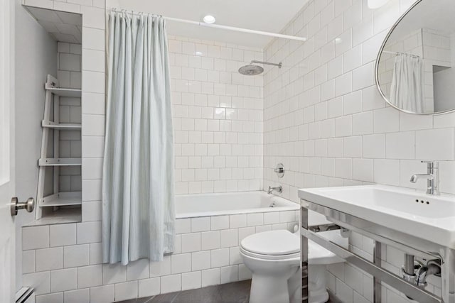 bathroom featuring toilet, tiled shower / bath combo, tile walls, and tasteful backsplash