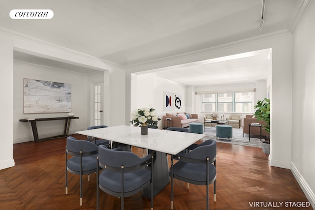 27 E 65th St Unit 5Bc, New York City, NY 10065 - dining space with ornamental molding and rail lighting