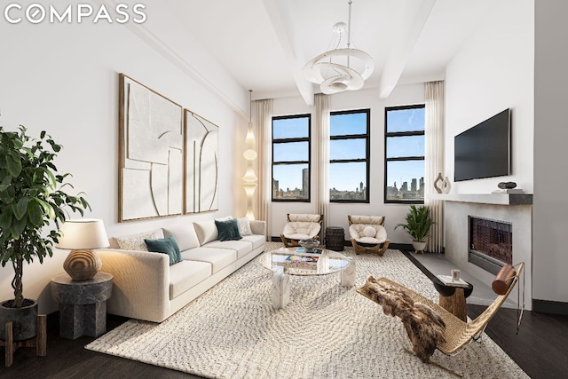 living room with beamed ceiling and hardwood / wood-style flooring