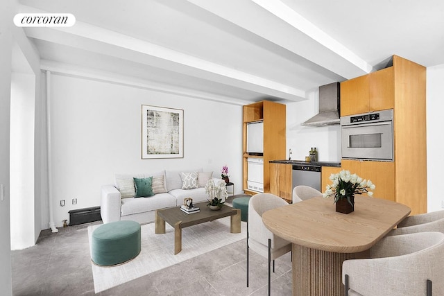 living area featuring beam ceiling and visible vents