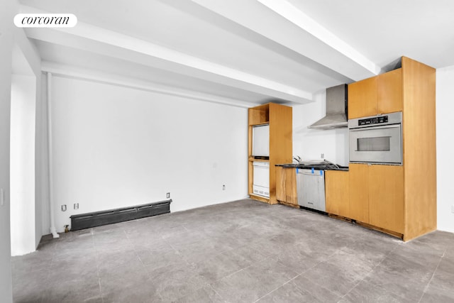 kitchen featuring appliances with stainless steel finishes and wall chimney exhaust hood