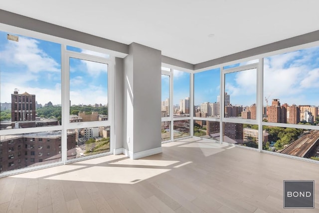 unfurnished sunroom with a wealth of natural light