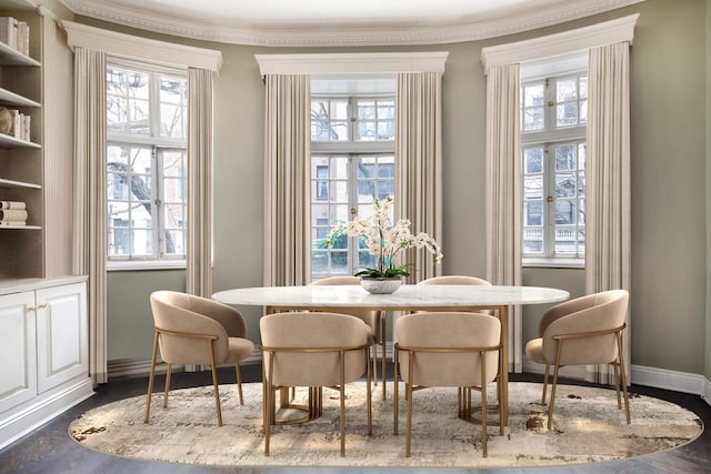 dining area with dark hardwood / wood-style flooring and crown molding