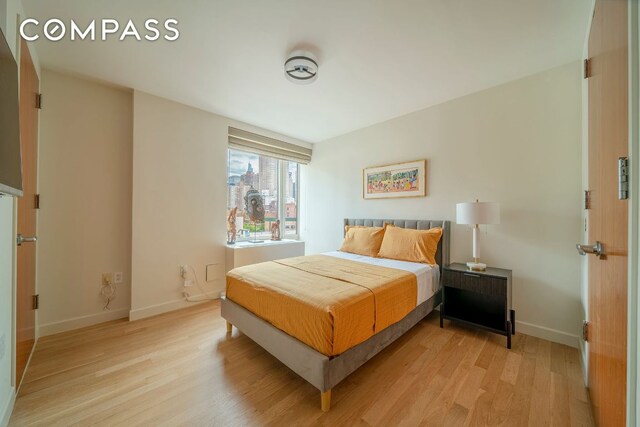 bedroom featuring light hardwood / wood-style floors