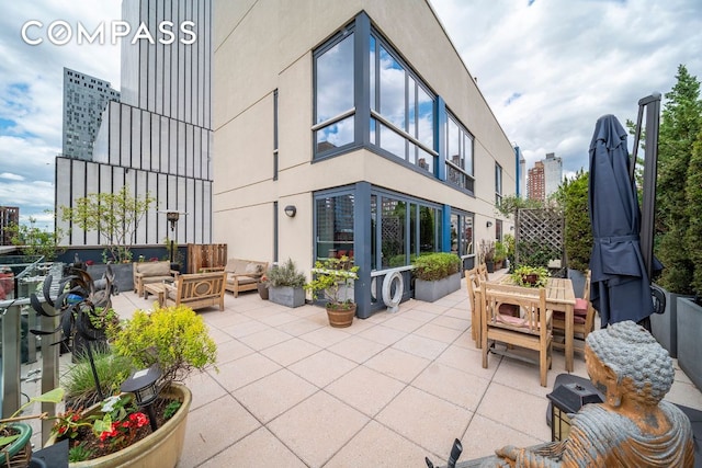 view of patio / terrace with an outdoor hangout area