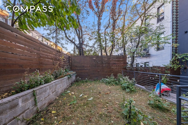 view of yard featuring a fenced backyard