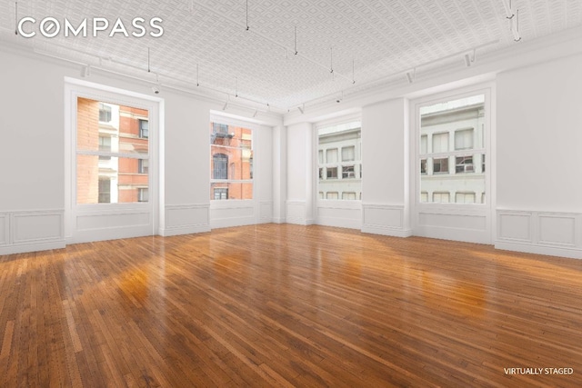 empty room featuring hardwood / wood-style flooring