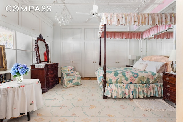 bedroom with ornamental molding and a ceiling fan