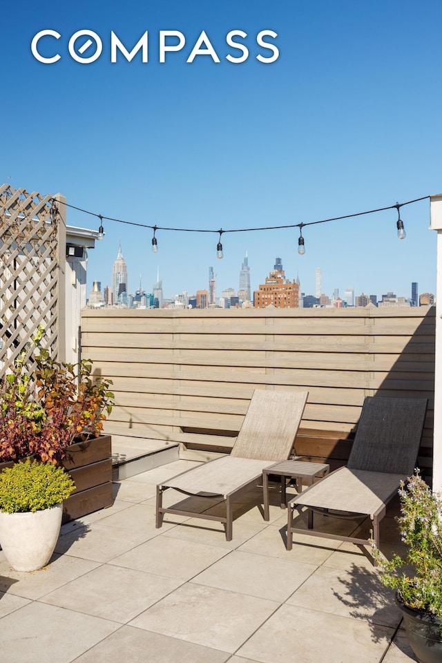 view of patio / terrace with a view of city