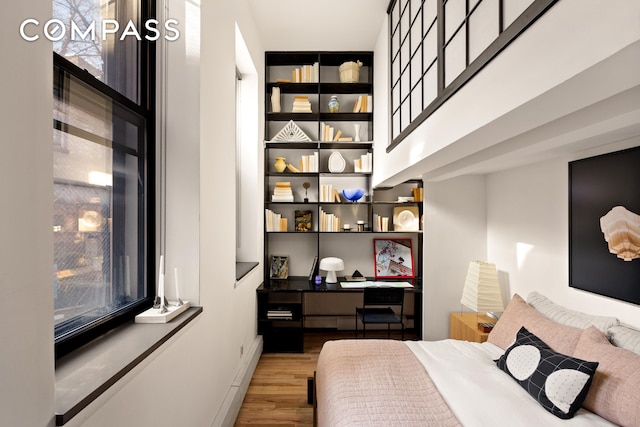 300 E 4th St Unit 2A, New York City, NY 10009 - bedroom with wood finished floors and baseboards