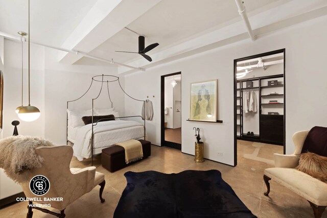 bedroom with a ceiling fan and concrete flooring