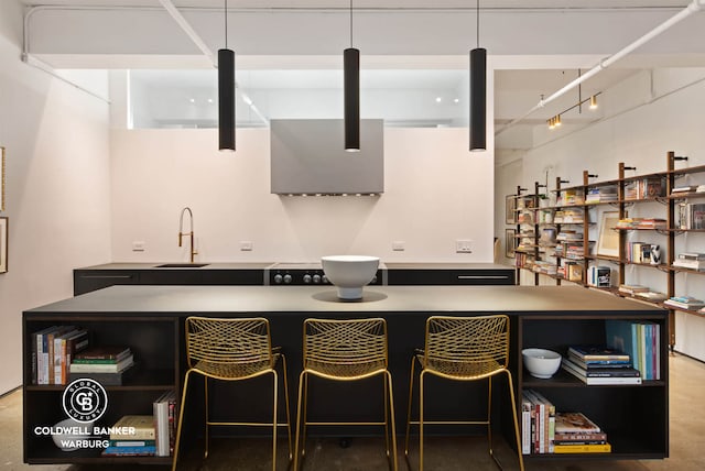 bar area with a sink