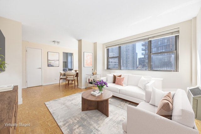 living room featuring light parquet floors