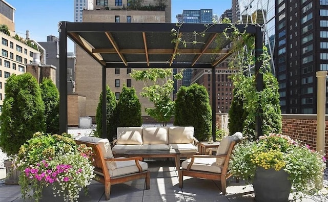 view of patio featuring an outdoor hangout area and a pergola