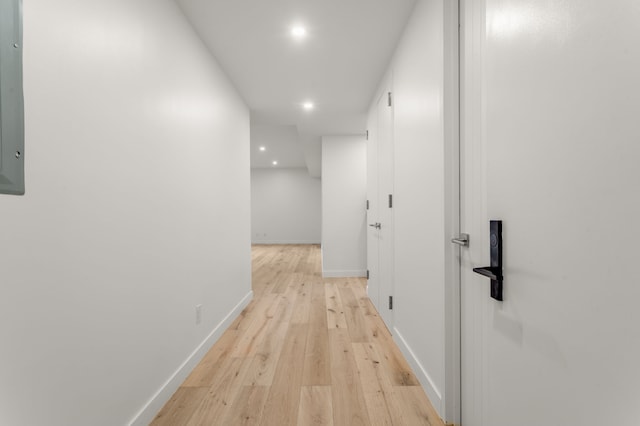 249 E 50th St Unit 7A, New York City, NY 10022 - hallway featuring recessed lighting, light wood-type flooring, and baseboards