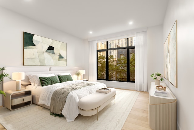 249 E 50th St Unit 7A, New York City, NY 10022 - bedroom featuring recessed lighting and light wood-style floors