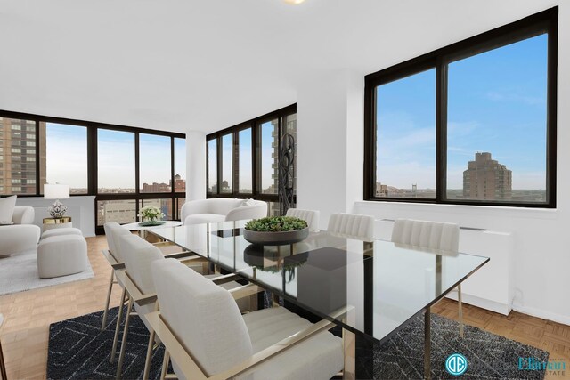 dining space featuring a view of city