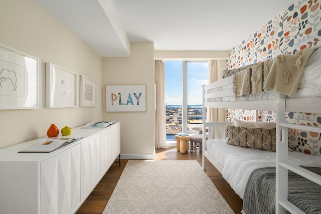 50 Bridge Park Dr Unit 25Ae, New York City, NY 11201 - bedroom featuring dark wood-style flooring and access to outside