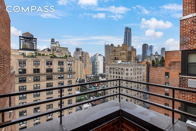 balcony featuring a city view