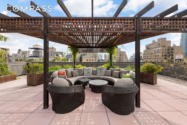 view of patio with a pergola, outdoor lounge area, and a city view