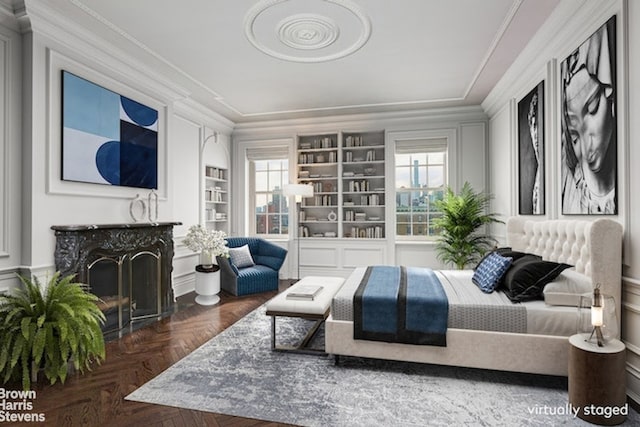 bedroom featuring crown molding and dark parquet floors